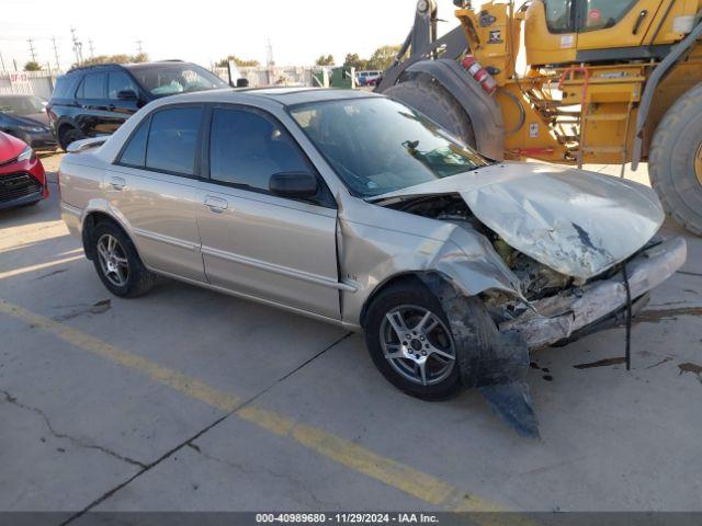  Salvage Mazda Protege