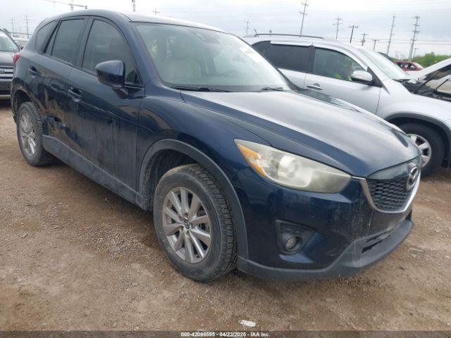 Salvage Mazda Cx
