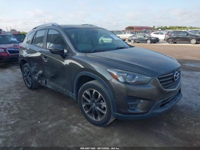  Salvage Mazda Cx